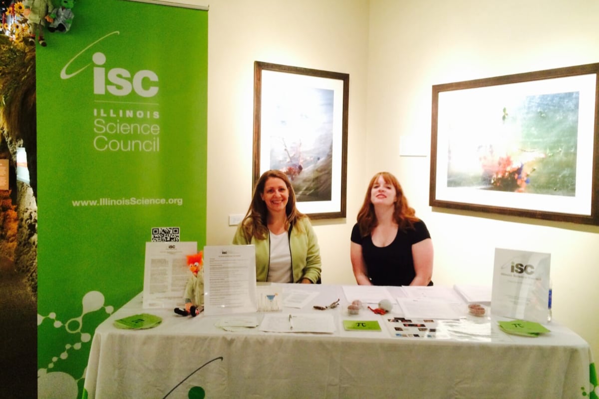 Two women representing the Illinois Science Council at an event.